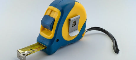 Blue and yellow tape measure
