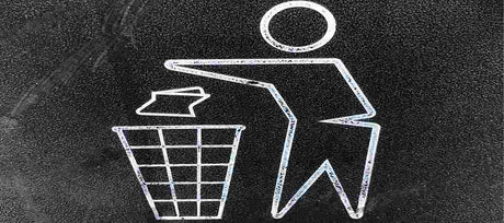 Man throwing trash in bin